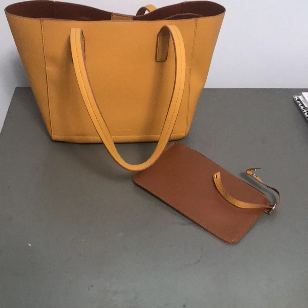 Tommy Bahama Reversible Faux Leather Tote Wristlet - Picture 5 of 16